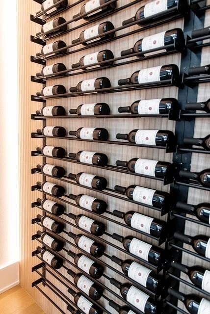 wine cellar featuring wood finished floors