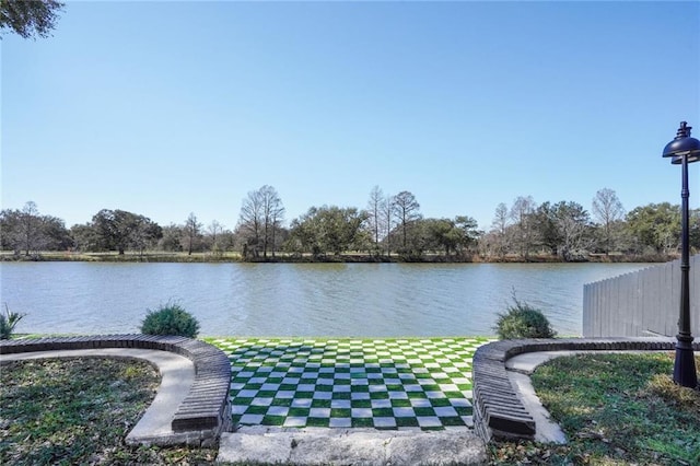 water view featuring fence