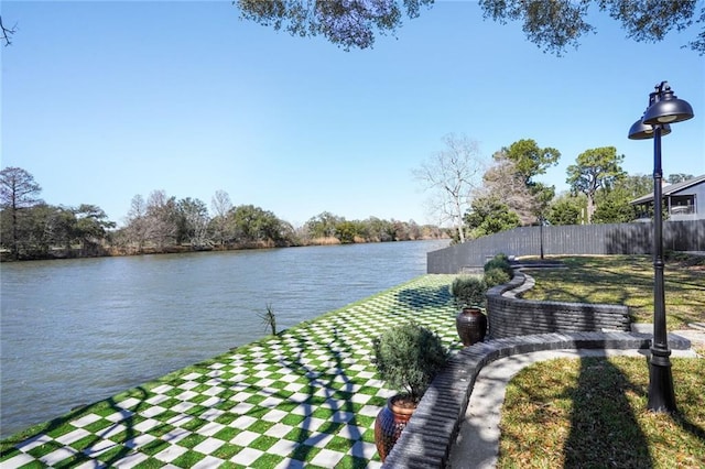 water view featuring fence