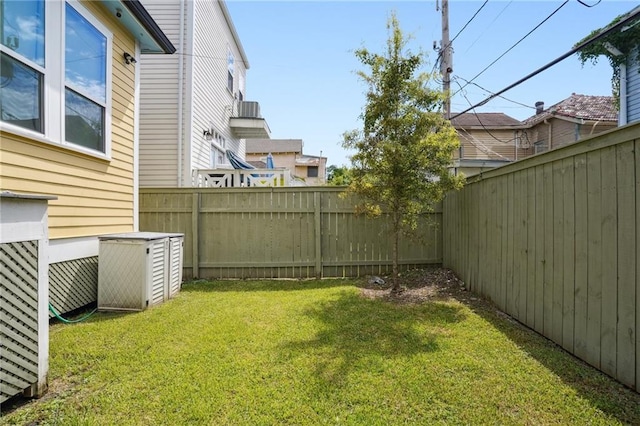 view of yard with a fenced backyard