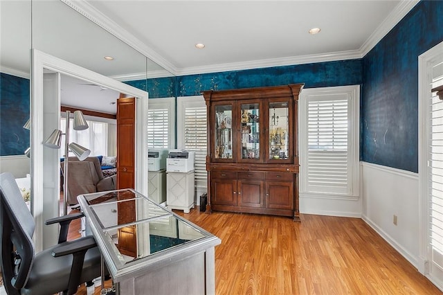 office featuring light wood-type flooring, baseboards, crown molding, and recessed lighting