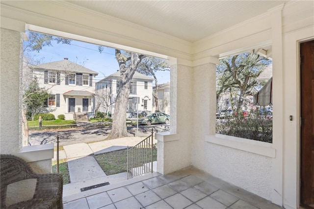 sunroom with a residential view