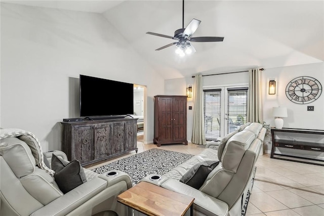 living area with light tile patterned floors, baseboards, high vaulted ceiling, and a ceiling fan