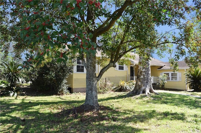 exterior space with a front lawn