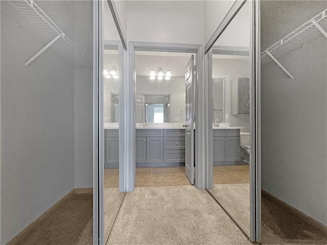 full bathroom with vanity and tile patterned floors