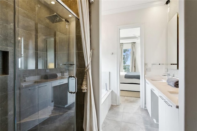 full bath featuring ensuite bathroom, a sink, a shower stall, tile patterned flooring, and crown molding