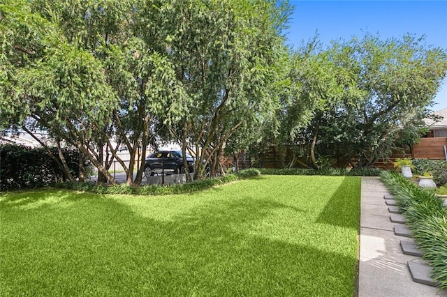 view of yard with fence