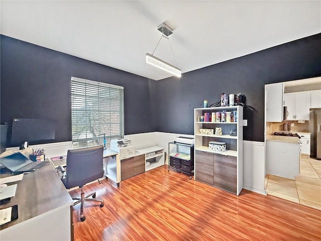 office space featuring light wood-type flooring