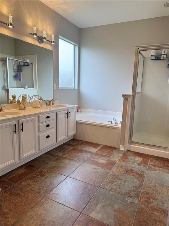 533 Moore Blvd, Covington, LA 70433 - bathroom with a shower stall, double vanity, and a bath