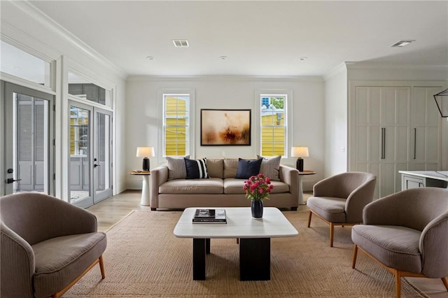 3324 Camp St, New Orleans, LA 70115 - living room featuring ornamental molding and light wood-style floors