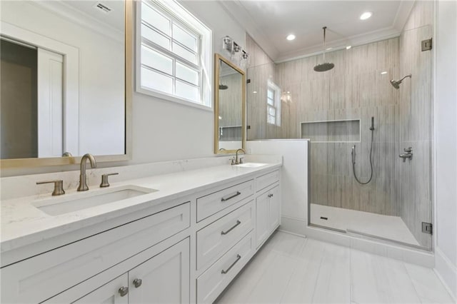 3324 Camp St, New Orleans, LA 70115 - bathroom featuring a stall shower, double vanity, crown molding, and recessed lighting