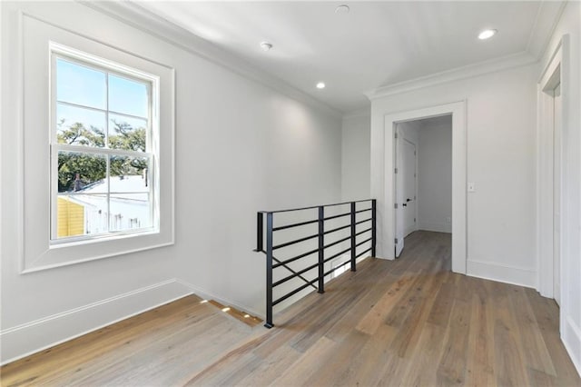 3324 Camp St, New Orleans, LA 70115 - hallway with an upstairs landing, crown molding, wood finished floors, and recessed lighting