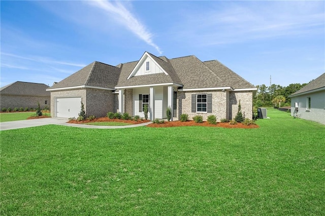 view of front facade featuring brick siding, a front yard, concrete driveway, and an attached garage