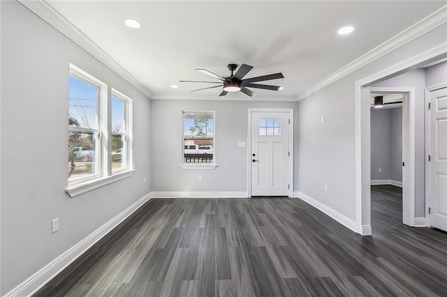 entrance foyer featuring baseboards, dark wood-type flooring, crown molding, and recessed lighting