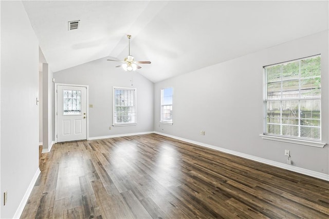 unfurnished living room featuring ceiling fan, wood finished floors, visible vents, baseboards, and vaulted ceiling