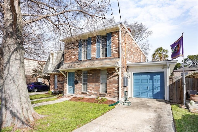 view of front of home featuring an attached garage, brick siding, fence, concrete driveway, and a front lawn