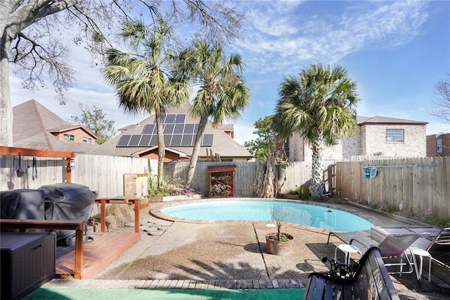 view of pool with a fenced backyard, a fenced in pool, and a patio