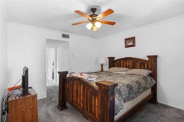 carpeted bedroom featuring ornamental molding, visible vents, baseboards, and a ceiling fan