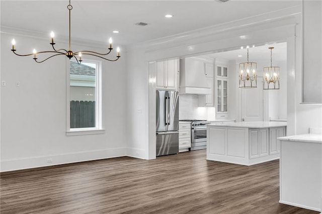 kitchen with stainless steel appliances, dark wood-type flooring, white cabinetry, light countertops, and custom exhaust hood