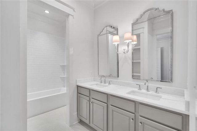 full bath featuring double vanity and a sink