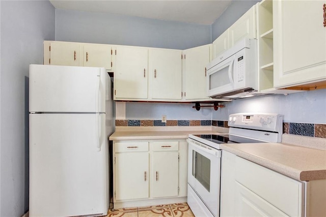 kitchen with white appliances and light countertops