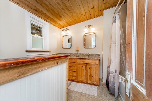 bathroom with tile patterned flooring, wooden ceiling, vanity, and a shower with curtain