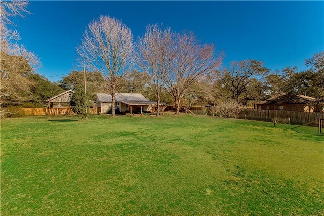 view of yard featuring fence