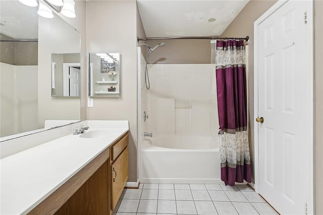 bathroom with shower / bathtub combination with curtain, vanity, and tile patterned floors