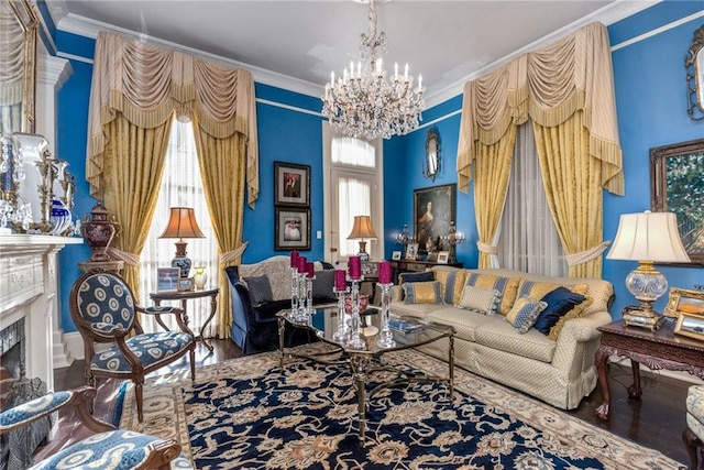 living area with ornamental molding, a high end fireplace, plenty of natural light, and wood finished floors