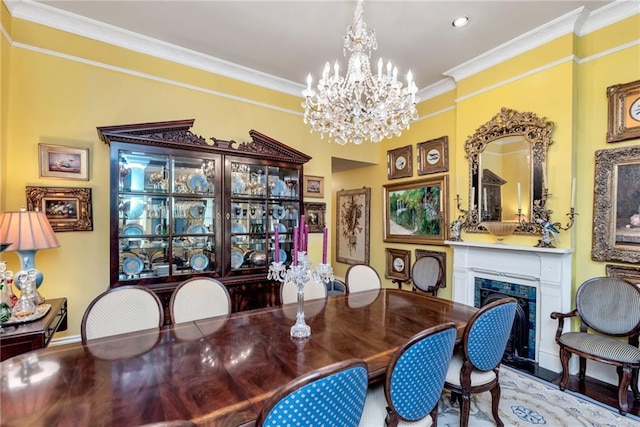 dining area featuring ornamental molding, a premium fireplace, wood finished floors, and a notable chandelier