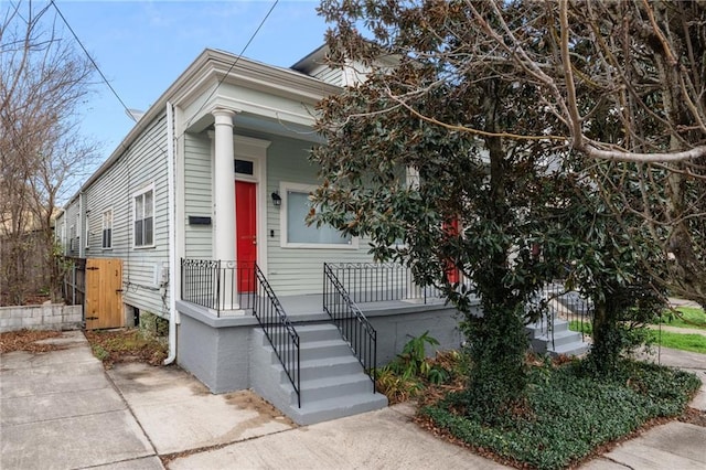 shotgun-style home with a porch