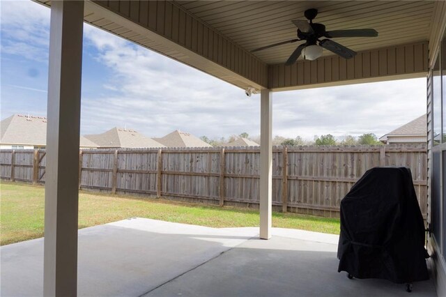 view of patio featuring a fenced backyard, ceiling fan, and area for grilling