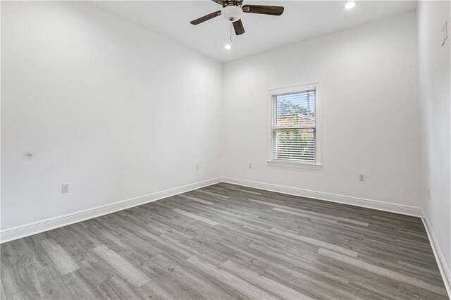 3507 Danneel St, New Orleans, LA 70115 - empty room with a ceiling fan, wood finished floors, recessed lighting, and baseboards