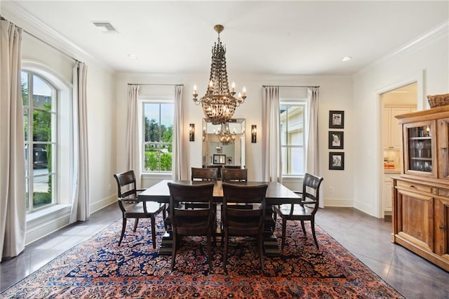 tiled dining space with visible vents, baseboards, a chandelier, and crown molding