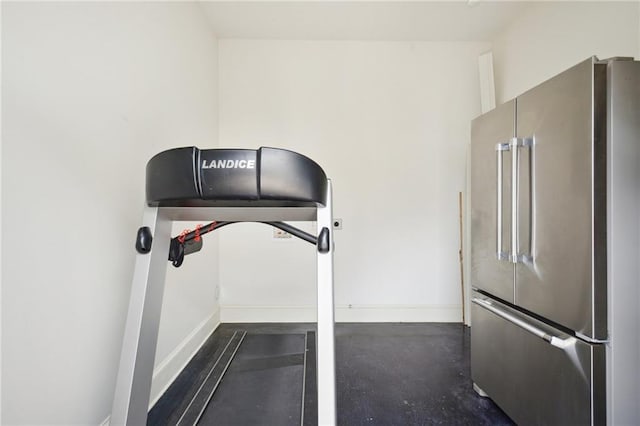 workout room with baseboards