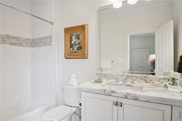 bathroom featuring vanity, bathing tub / shower combination, toilet, and ornamental molding