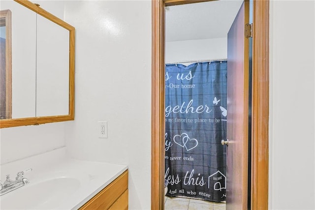 bathroom with vanity and a shower with curtain