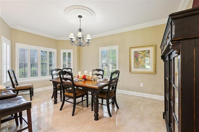 dining space featuring a notable chandelier, a wealth of natural light, and ornamental molding