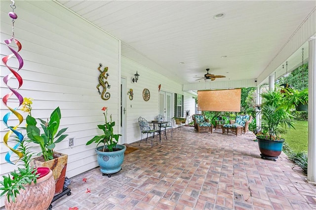 view of patio / terrace featuring a ceiling fan and an outdoor hangout area