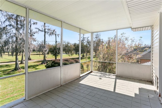 unfurnished sunroom with a wealth of natural light