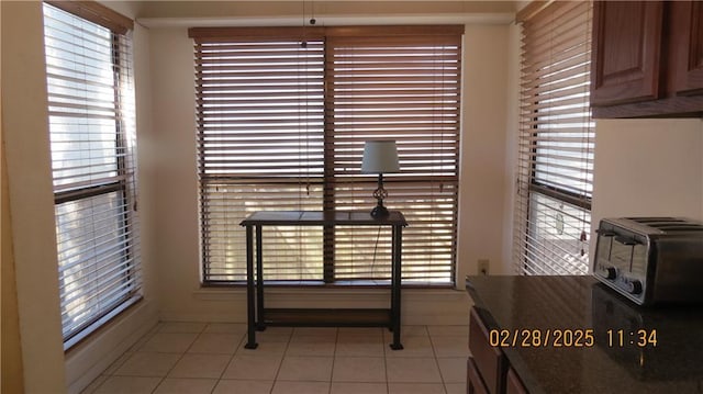 227 Plimsol Ct Unit 227, Slidell, LA 70460 - dining space with plenty of natural light and light tile patterned flooring