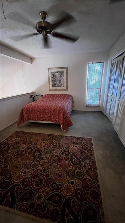 227 Plimsol Ct Unit 227, Slidell, LA 70460 - carpeted bedroom with ceiling fan and a textured ceiling