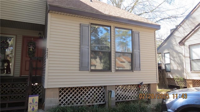 227 Plimsol Ct Unit 227, Slidell, LA 70460 - view of side of property with a shingled roof