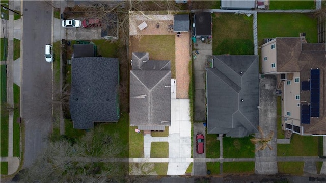 birds eye view of property with a residential view