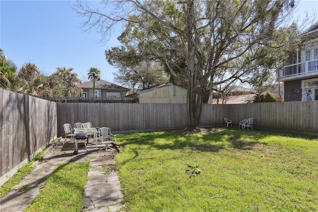 view of yard with a fenced backyard