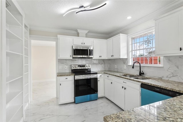 kitchen with white cabinets, light stone counters, marble finish floor, stainless steel appliances, and a sink