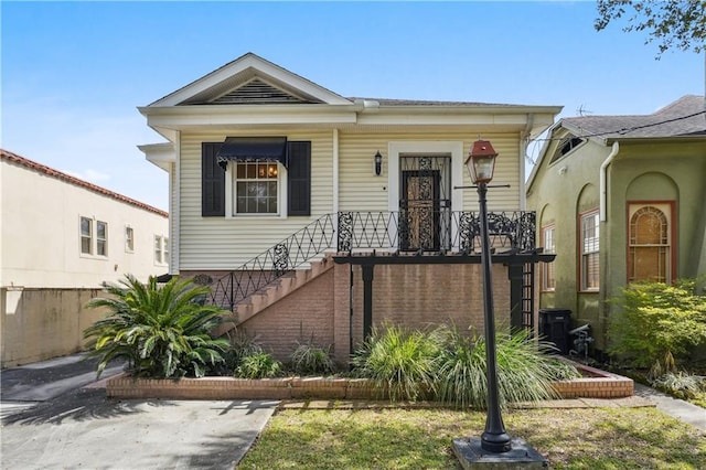 5367 Canal Blvd, New Orleans, LA 70124 - view of front facade with stairs and a porch