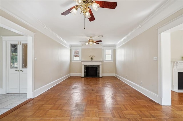 unfurnished living room featuring baseboards, a fireplace, and crown molding