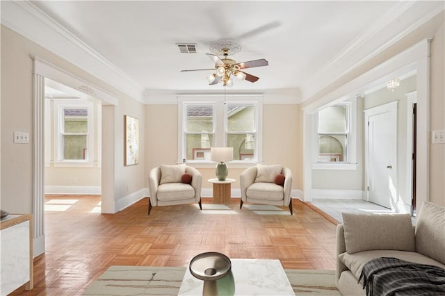 interior space featuring a ceiling fan and visible vents