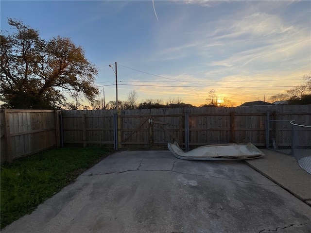 exterior space with a patio and fence